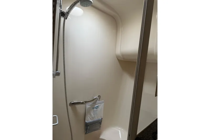 Slide: The Image of Shower area in 2007 Sea Ray 44 Sedan Bridge yacht, featuring modern fixtures. - 57