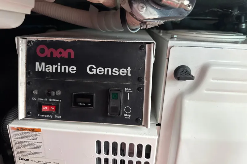 Slide: The Image of Onan Marine Genset in 2007 Sea Ray 44 Sedan Bridge engine room. - 61