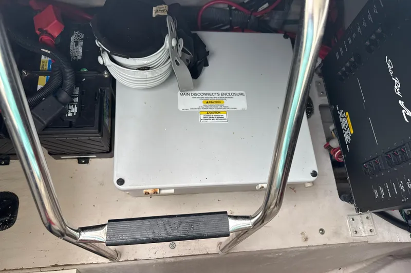 Slide: The Image of Electrical components in a 2007 Sea Ray 44 Sedan Bridge boat engine compartment. - 67