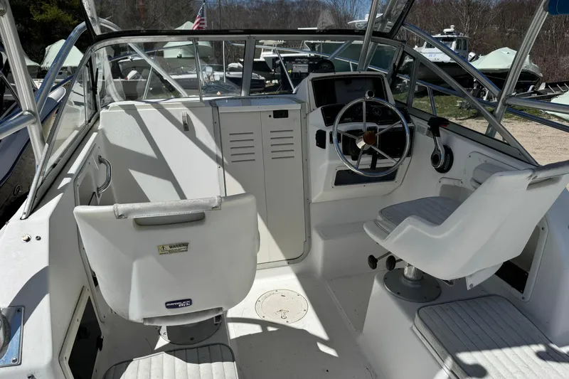 Slide: The Image of Interior view of a 2000 Boston Whaler 21 Conquest boat cockpit. - 5