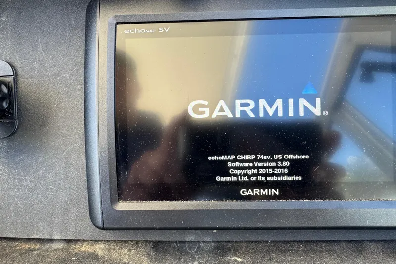 Slide: The Image of Garmin echoMAP SV on 2000 Boston Whaler 21 Conquest boat dashboard. - 7