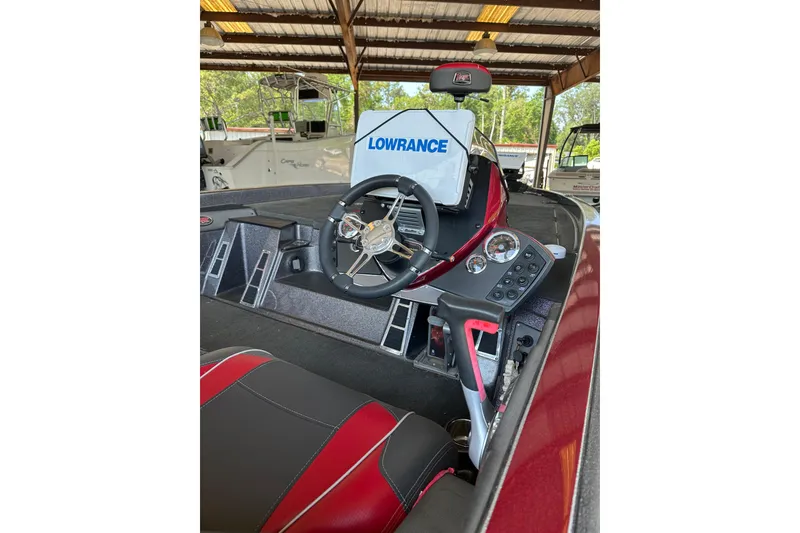 Slide: The Image of 2017 Ranger Z518 Comanche boat interior with steering wheel and Lowrance display. - 5