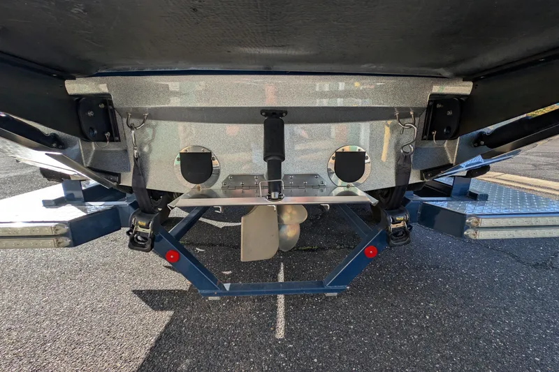 Slide: The Image of Rear view of a 2016 MasterCraft X10 boat on a trailer. - 52
