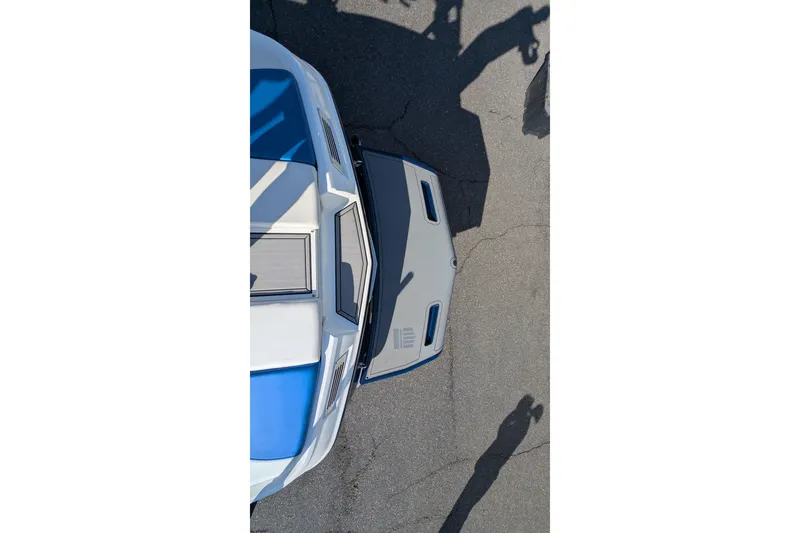 Slide: The Image of Overhead view of 2016 MasterCraft X10 boat on pavement. - 53