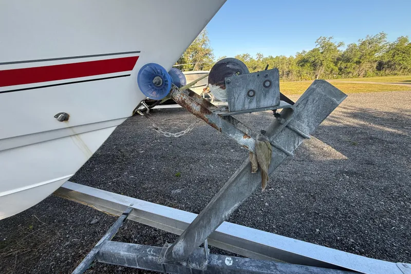 Slide: The Image of Close-up of a 2002 Century 2900 Walk-Around boat on a trailer. - 27