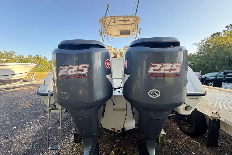 Slide: The Image of 2002 Century 2900 Walk-Around boat with twin Yamaha 225 horsepower outboard engines. - 30