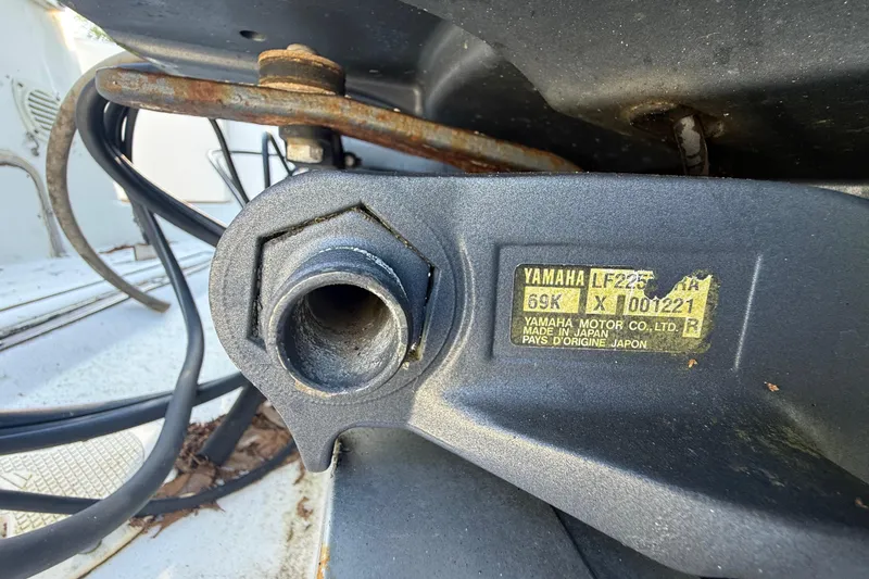 Slide: The Image of Close-up of Yamaha motor part on 2002 Century 2900 Walk-Around boat. - 35