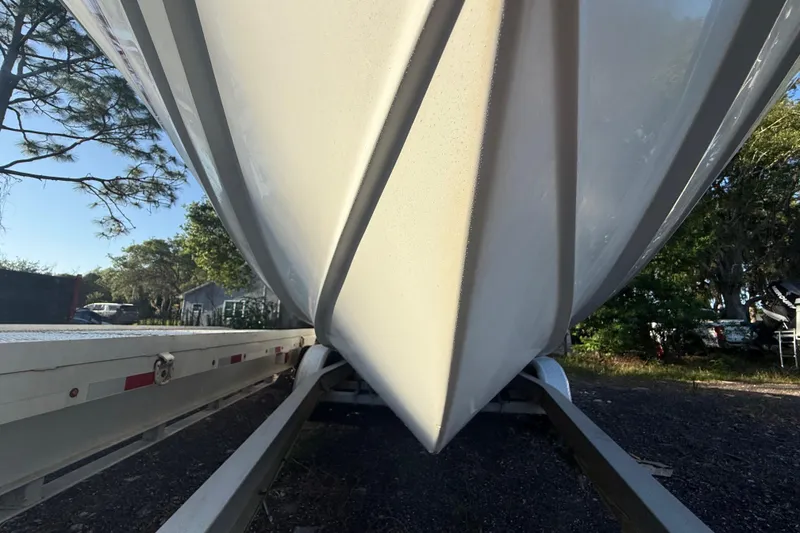 Slide: The Image of Close-up of 2002 Century 2900 Walk-Around boat hull on trailer. - 40
