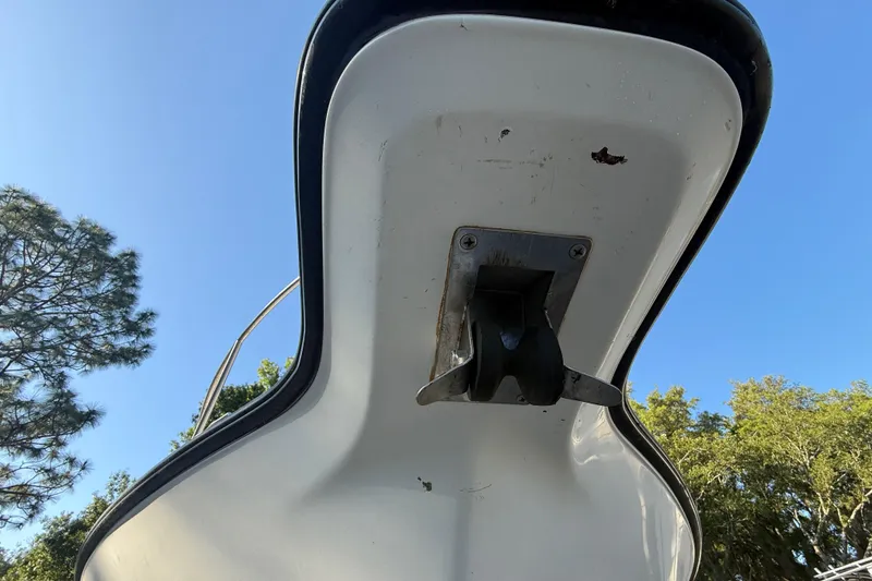 Slide: The Image of Underside view of a 2002 Century 2900 Walk-Around boat against a clear sky. - 43