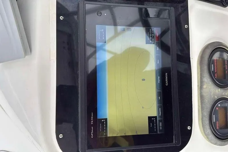 Slide: The Image of Garmin GPS display on 2002 Century 2900 Walk-Around boat dashboard. - 74