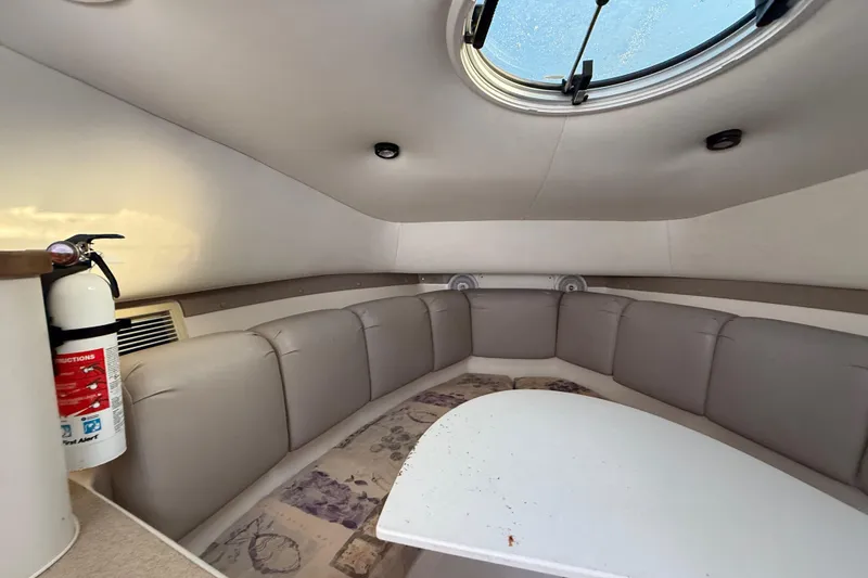Slide: The Image of Interior of 2002 Century 2900 Walk-Around boat with seating and skylight. - 88
