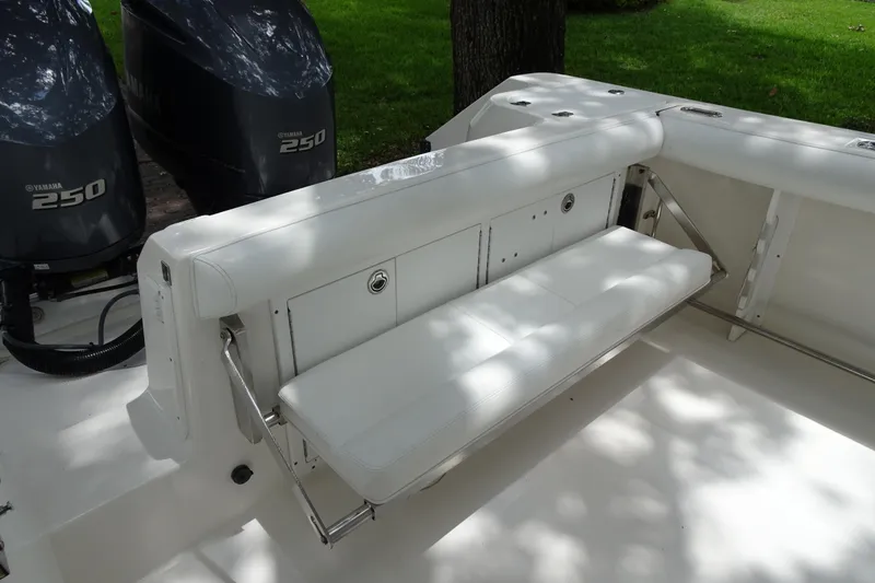 Slide: The Image of 2006 Edgewater 265CC boat with Yamaha 250 engines and foldable seating. - 25