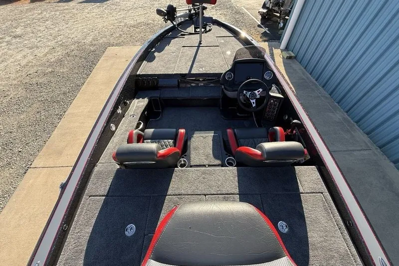 Slide: The Image of 2026 Phoenix 818 Pro boat interior with dual seats and steering console. - 25