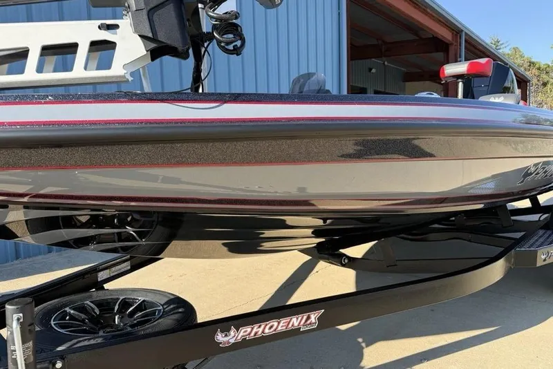 Slide: The Image of 2026 Phoenix 818 Pro boat on trailer, sleek design, metallic finish. - 3