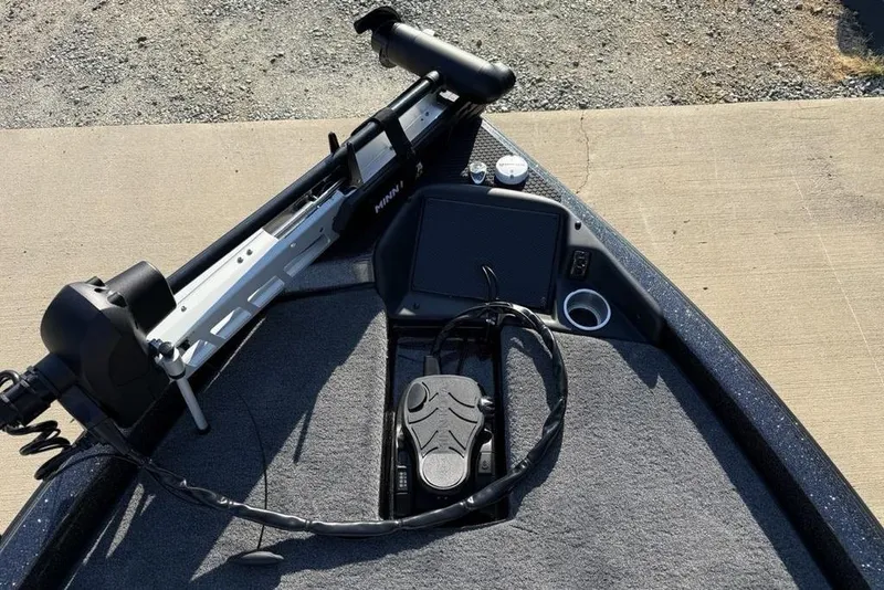 Slide: The Image of Front deck of 2026 Phoenix 818 Pro boat with trolling motor and foot pedal. - 4