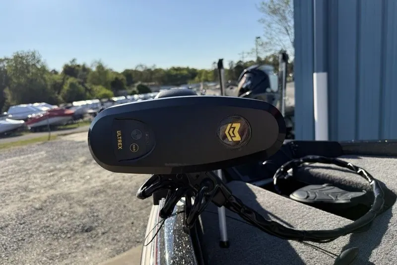 Slide: The Image of Trolling motor on a 2026 Phoenix 818 Pro boat, parked outdoors. - 5