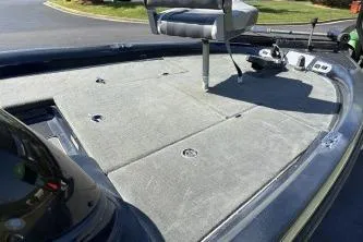 Slide: The Image of 2006 Stratos 275 Pro XL boat deck with seating and control panel. - 6