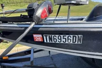 Slide: The Image of 2006 Stratos 275 Pro XL boat with registration TN6956DN displayed. - 8