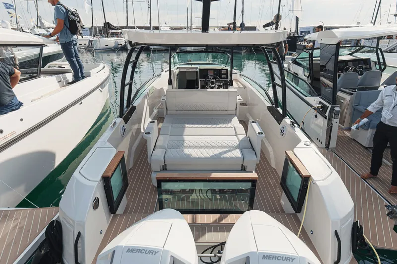 Slide: The Image of Saxdor 270 GTO 2027: Stylish motorboat with spacious deck and modern amenities at the marina. - 2