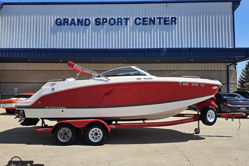 The Image of 2018 Four Winns HD220 boat on trailer at Grand Sport Center. - 1