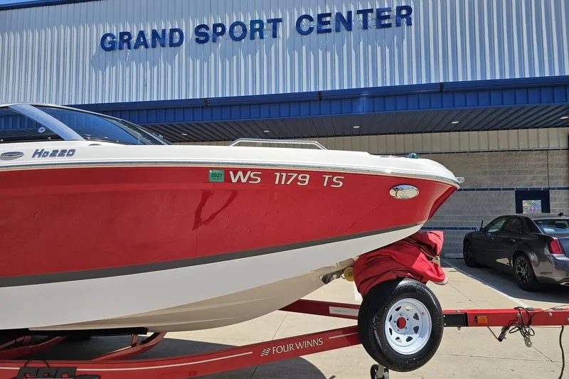 Slide: The Image of 2018 Four Winns HD220 boat on trailer at Grand Sport Center. - 15