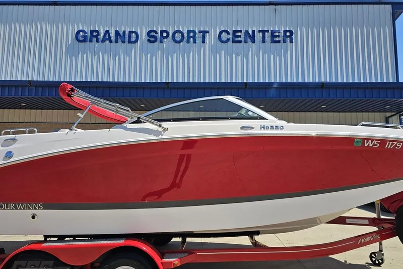 Slide: The Image of 2018 Four Winns HD220 boat in red at Grand Sport Center. - 3