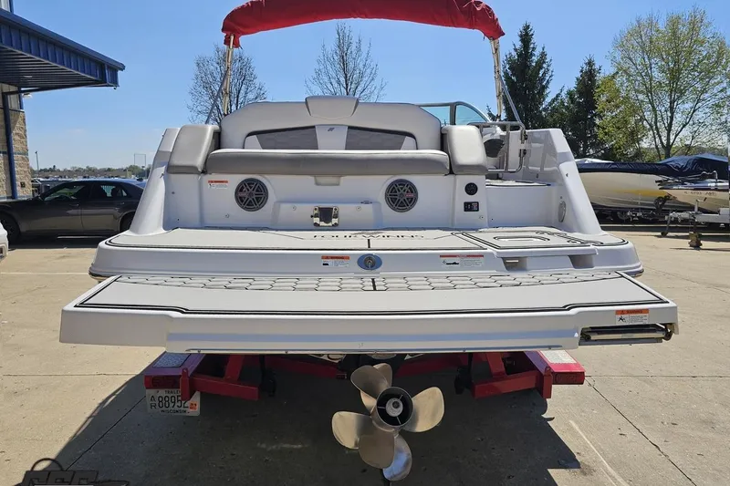 Slide: The Image of 2018 Four Winns HD220 boat rear view with swim platform and propeller. - 33