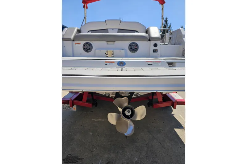 Slide: The Image of Rear view of a 2018 Four Winns HD220 boat on a trailer. - 36