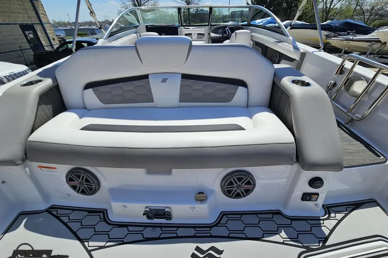 Slide: The Image of 2018 Four Winns HD220 boat interior with cushioned seating and modern design elements. - 41