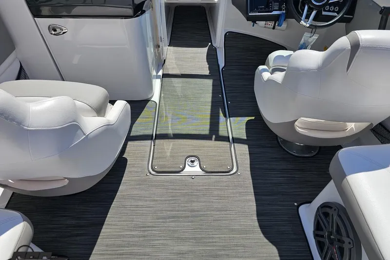 Slide: The Image of Interior of a 2018 Four Winns HD220 boat with modern seating and sleek design. - 62