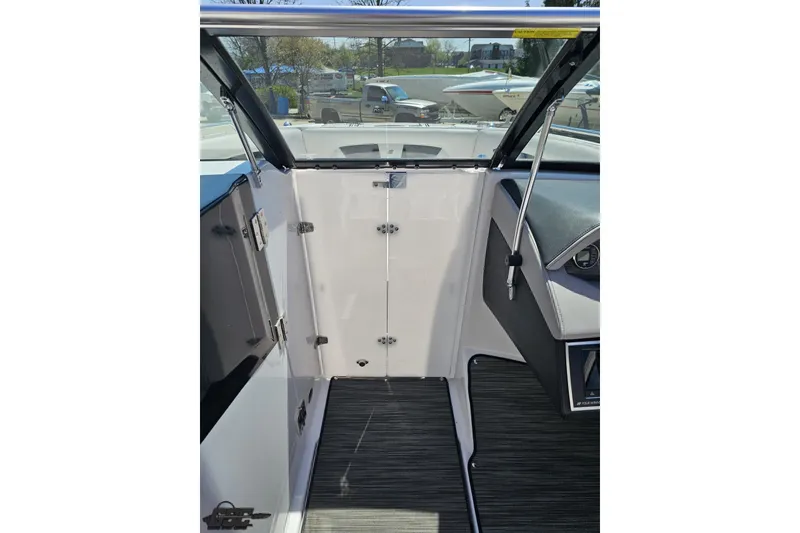 Slide: The Image of Interior view of 2018 Four Winns HD220 boat, featuring sleek design and modern finishes. - 78