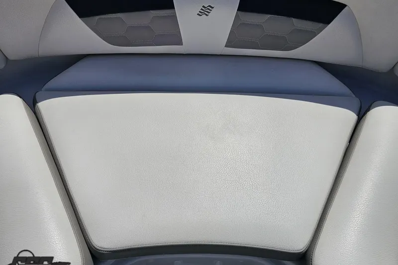 Slide: The Image of 2018 Four Winns HD220 boat interior seating with gray and blue upholstery. - 87