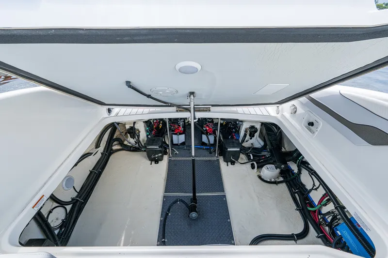 Slide: The Image of 2022 Formula 310 Bowrider OB engine compartment, showcasing organized wiring and components. - 66
