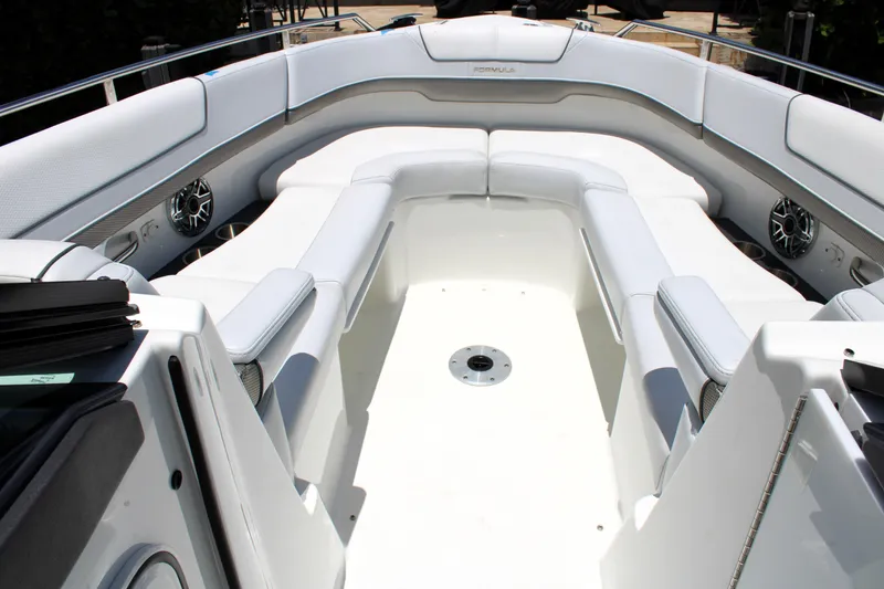 Slide: The Image of 2022 Formula 310 Bowrider OB boat interior with spacious seating and modern design. - 11