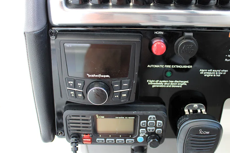 Slide: The Image of Control panel of 2022 Formula 310 Bowrider OB with audio and communication systems. - 15