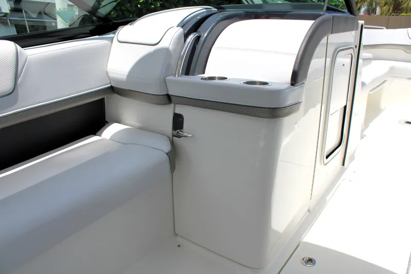 Slide: The Image of 2022 Formula 310 Bowrider OB interior with sleek seating and cup holders. - 18