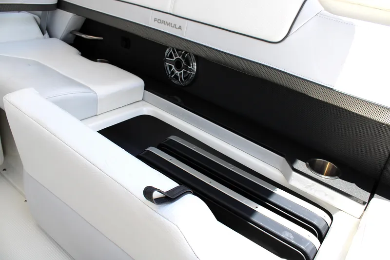 Slide: The Image of 2022 Formula 310 Bowrider OB interior with sleek seating and modern speaker system. - 22