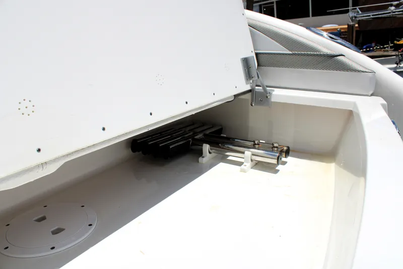 Slide: The Image of 2022 Formula 310 Bowrider OB storage compartment with stainless steel fittings. - 25