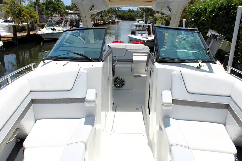 Slide: The Image of 2022 Formula 310 Bowrider OB interior, featuring spacious seating and sleek design. - 29