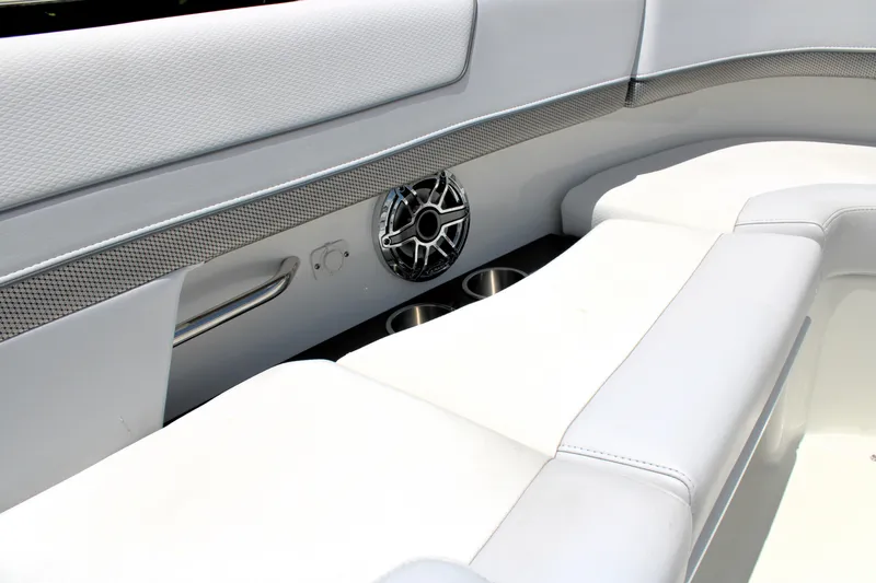 Slide: The Image of Interior of 2022 Formula 310 Bowrider OB with white seating and speaker detail. - 30
