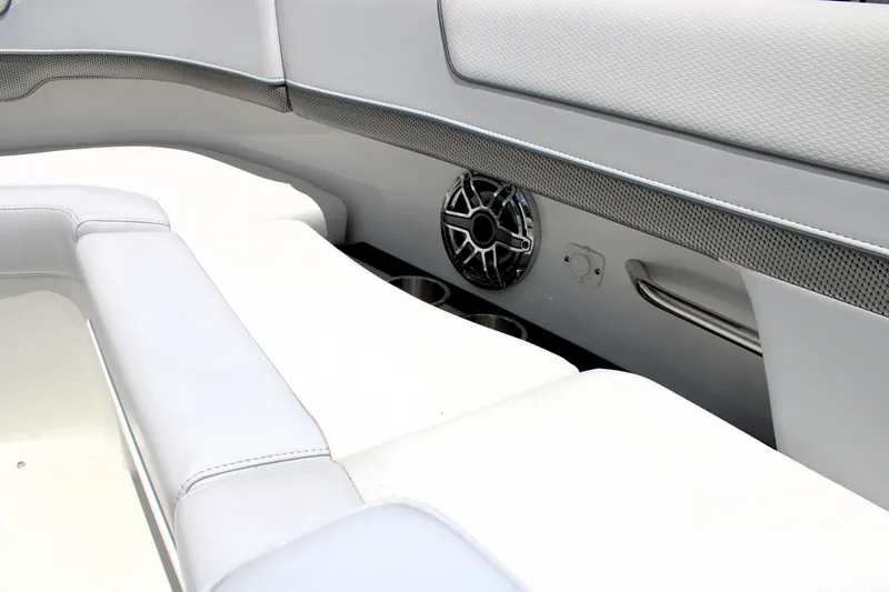 Slide: The Image of 2022 Formula 310 Bowrider OB interior with sleek seating and integrated speaker system. - 31
