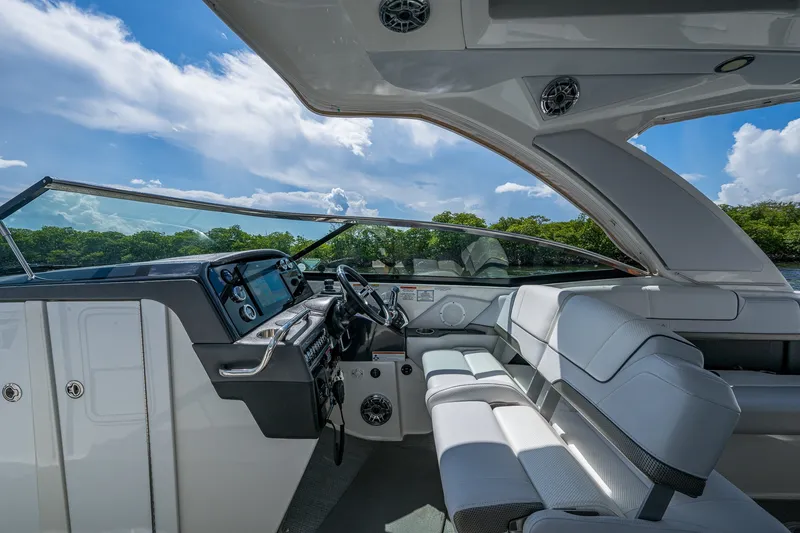 Slide: The Image of 2022 Formula 310 Bowrider OB interior with sleek design and modern dashboard. - 58