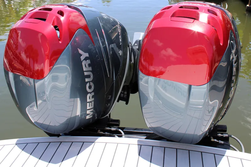 Slide: The Image of Twin Mercury outboard engines on a 2022 Formula 310 Bowrider OB boat. - 5