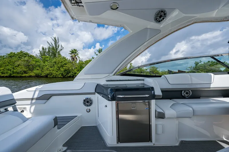 Slide: The Image of 2022 Formula 310 Bowrider OB interior with sleek seating and modern amenities. - 49