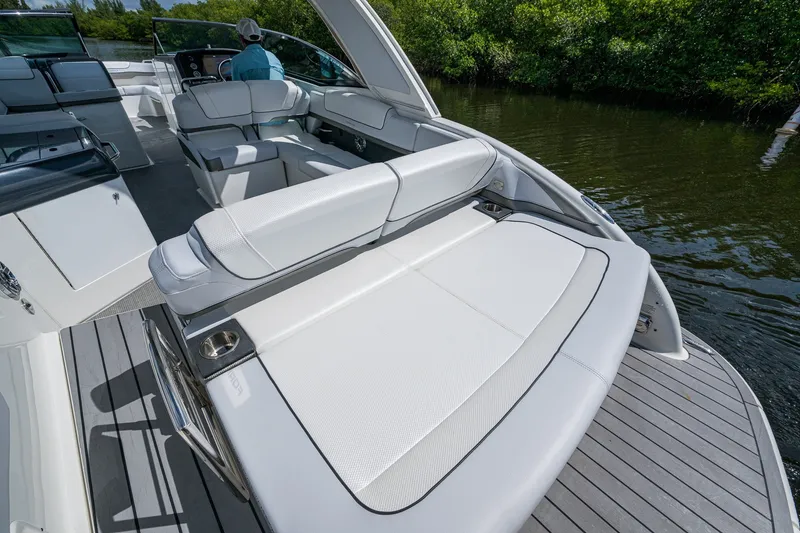Slide: The Image of 2022 Formula 310 Bowrider OB boat interior with luxurious seating and sleek design. - 43