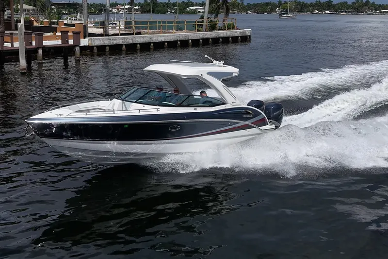 Slide: The Image of 2022 Formula 310 Bowrider OB cruising on water, showcasing sleek design and powerful performance. - 20