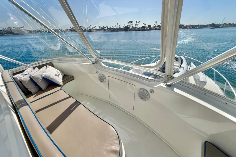 Slide: The Image of Luxurious seating area on 2002 Viking 48 Convertible yacht with ocean view. - 18