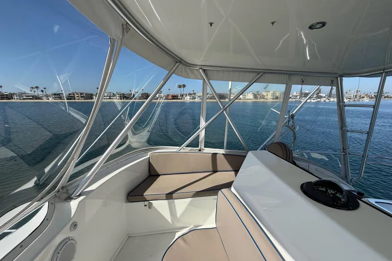 Slide: The Image of Interior view of a 2002 Viking 48 Convertible yacht with ocean backdrop. - 19