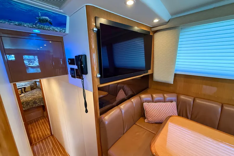 Slide: The Image of Luxurious interior of 2002 Viking 48 Convertible yacht with leather seating and modern amenities. - 29