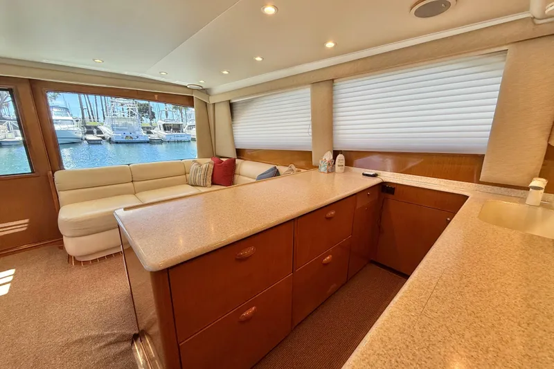 Slide: The Image of Luxurious interior of 2002 Viking 48 Convertible yacht with spacious seating and elegant design. - 37